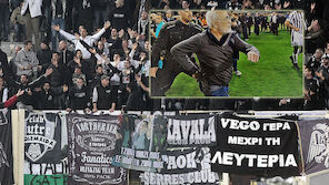 PAOK-Eigentümer mit Pistole am Feld